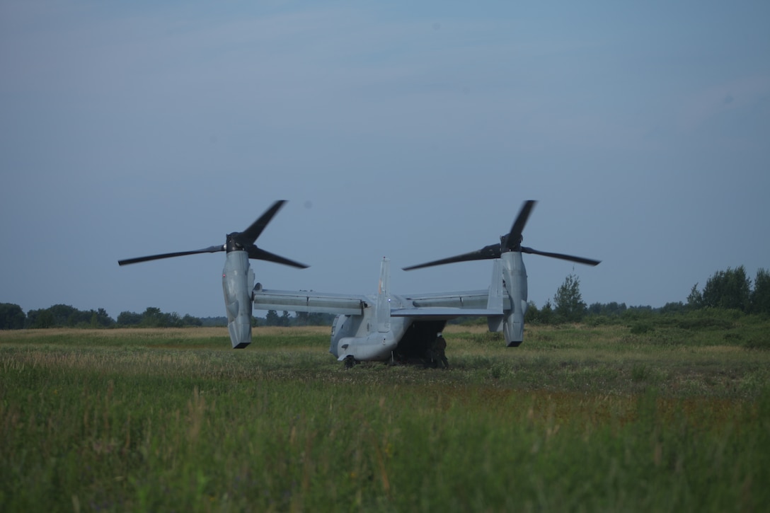 U.S. Marines disembark and offload equipment from an MV-22 Osprey ‘jump’ combat operations center event during Atlantic Alliance 25 (AA25)