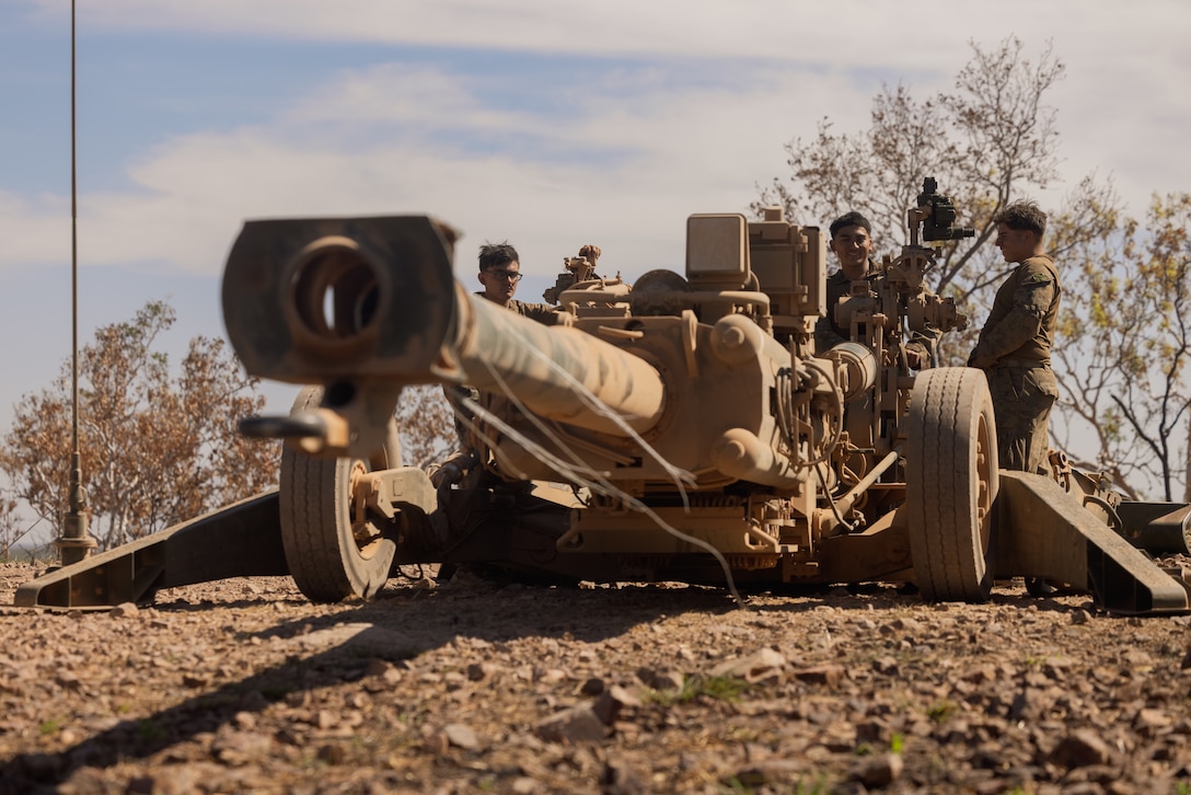 U.S. Marines with Kilo Battery, 3rd Battalion, 11th Marine Regiment, Marine Rotational Force – Darwin 25.3, set up a boresight on an M777 Howitzer during Talisman Sabre 25 in the Northern Territory, Australia, July 11, 2025.