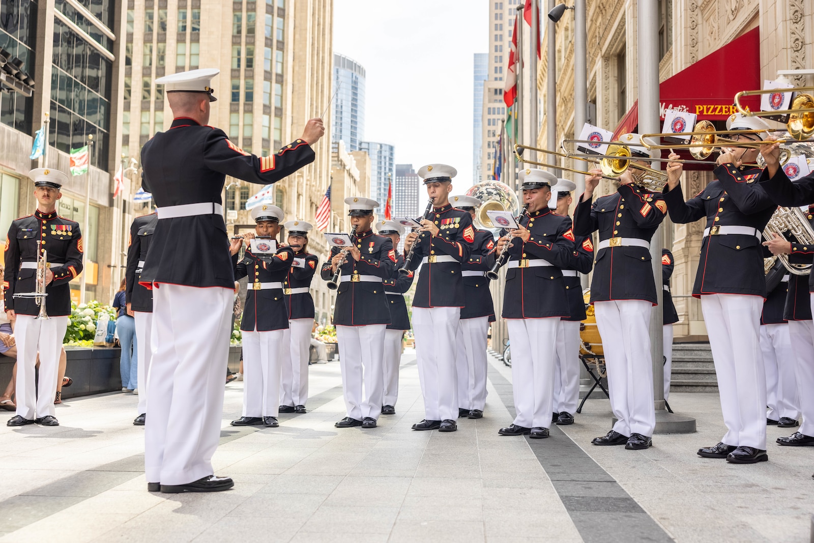 U.S. Marines with the Quantico Marine Band perform at the Daley Plaza during the opening ceremony for Marine Week, Chicago, Illinois, July 10, 2025. Marines from around the Corps and the people of Chicago attended Marine Week Chicago to celebrate the Marine Corps’ 250th anniversary, which consisted of live performances, music, ceremonies, events, and displays of equipment, and aircraft. (U.S. Marine Corps photo by Lance Cpl. Harleigh Faulk)