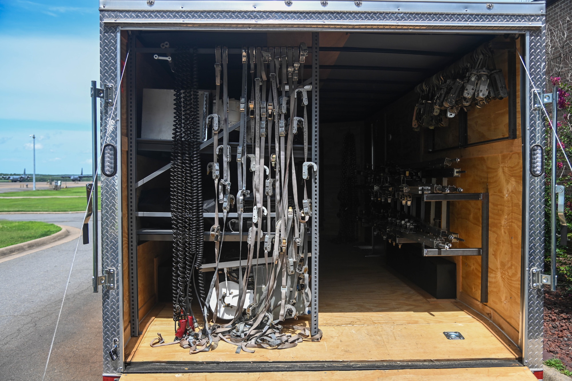 A cargo trailer with tools inside.