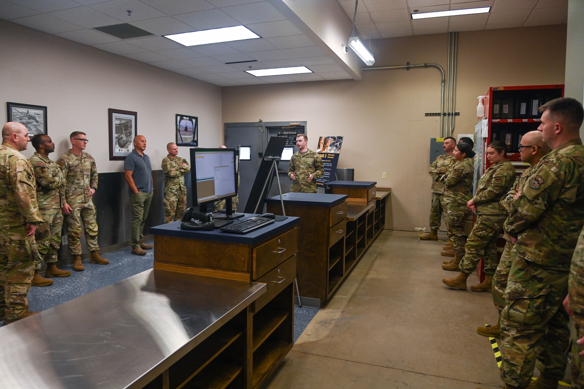 Service members attend a brief.