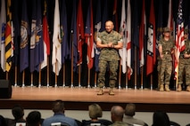 U.S. Marine Corps Sgt. Maj. Peter A. Siaw, incoming Marine Corps Combat Development Command Sgt. Maj. gives his remarks during a relief and appointment ceremony on Marine Corps Base Quantico, Va., July 11, 2025. At the ceremony, CD&I bid farewell to Sgt. Maj. Anthony J. Loftus and welcomed Sgt. Maj. Peter A. Siaw. (U.S. Marine Corps photo by Michael Bartman)