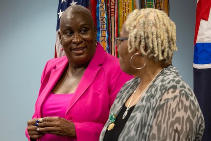 Kimberly Lawrence, U.S. Army Financial Management Command Military Pay Operations division director, shares a moment with Wilhemenia Taylor, USAFMCOM MPO financial management analyst, during Taylor’s retirement ceremony at the Maj. Gen. Emmett J. Bean Federal Center in Indianapolis June 30, 2025. Taylor retired from USAFMCOM after more than 30 years of federal civil service and 15 years of military service. (U.S. Army photo by Mark R. W. Orders-Woempner)