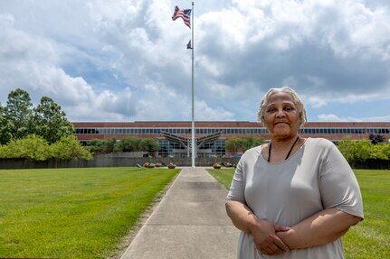Wilhemenia Taylor, U.S. Army Financial Management Command Military Pay Operations financial management analyst, poses for a photo outside the Maj. Gen. Emmett J. Bean Federal Center in Indianapolis June 18, 2025. Taylor retired from USAFMCOM after more than 30 years of federal civil service and 15 years of military service. (U.S. Army photo by Mark R. W. Orders-Woempner)