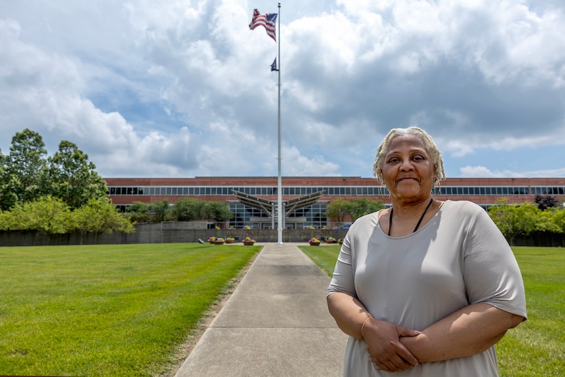 Wilhemenia Taylor, U.S. Army Financial Management Command Military Pay Operations financial management analyst, poses for a photo outside the Maj. Gen. Emmett J. Bean Federal Center in Indianapolis June 18, 2025. Taylor retired from USAFMCOM after more than 30 years of federal civil service and 15 years of military service. (U.S. Army photo by Mark R. W. Orders-Woempner)