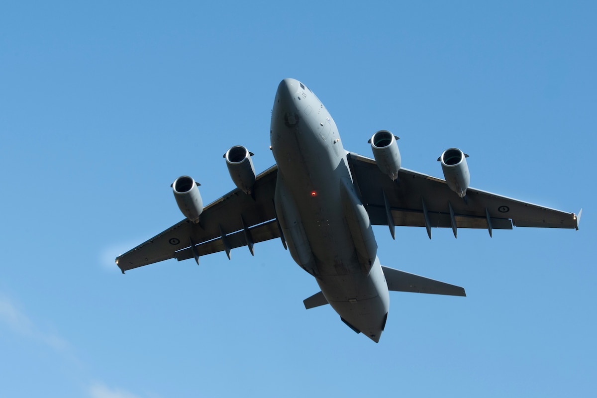 A Royal Australian Air Force C-17 Globemaster III departs from Joint Base Elmendorf-Richardson, Alaska, providing airlift support for 11th Airborne Division soldiers participating in Talisman Sabre 25, July 13, 2025.