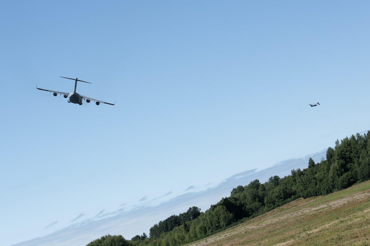 A Royal Australian Air Force C-17 Globemaster III departs from Joint Base Elmendorf-Richardson, Alaska providing airlift support for 11th Airborne Division soldiers participating in Talisman Sabre 25, July 13, 2025.