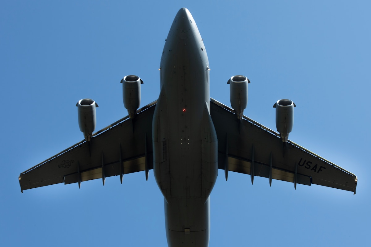 A U.S. Air Force C-17 Globemaster III assigned to the 164th Airlift Wing, Tennessee Air National Guard, departs from Joint Base Elmendorf-Richardson, Alaska, providing airlift support for 11th Airborne Division soldiers participating in Talisman Sabre 25, July 13, 2025.