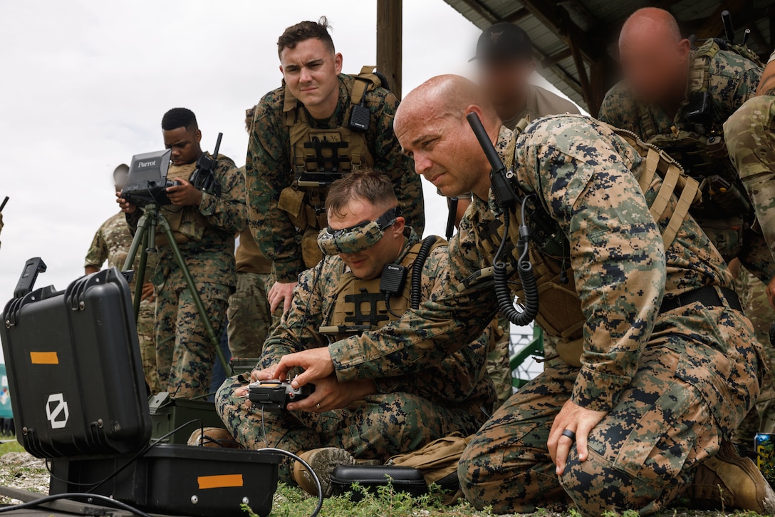 U.S. Marines with the Marine Corps Attack Drone Team conduct group one small Unmanned Aerial System tactical flight operations during a sUAS joint interoperability training exercise at an undisclosed location within the U.S. Northern Command area of responsibility, July 2, 2025. The training exercise allowed participants to exchange Tactics, Techniques and Procedures in sUAS operations while training in a joint environment to enhance the effectiveness and lethality of sUAS capabilities across the Department of Defense. (U.S. Marine Corps photo by Cpl. Joshua Barker)