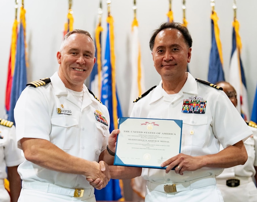 250711-O-SI336-1123 Naval Medical Readiness Training Unit (NMRTU) Dahlgren and Naval Medical Readiness Training Center (NMRTC) Detachment Indian Head held a change of charge ceremony on Friday, July 11, 2025. Capt. Ken Radford (pictured left), commanding officer of NMRTC Patuxent River, presided over the traditional event. Lt. Cmdr. Kristoffer Reyes (pictured right) is departing after a successful period of leadership. NMRTC Patuxent River serves as the parent command for Navy Medical Readiness Training Unit (NMRTU) Dahlgren and Naval Medical Readiness Training Center (NMRTC) Detachment Indian Head. Cmdr. Jennifer Williams assumed responsibility as the officer in charge of both locations. Photo Credit: TSgt. William A. Whetstone