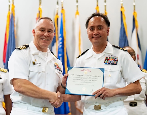 250711-O-SI336-1123 Naval Medical Readiness Training Unit (NMRTU) Dahlgren and Naval Medical Readiness Training Center (NMRTC) Detachment Indian Head held a change of charge ceremony on Friday, July 11, 2025. Capt. Ken Radford (pictured left), commanding officer of NMRTC Patuxent River, presided over the traditional event. Lt. Cmdr. Kristoffer Reyes (pictured right) is departing after a successful period of leadership. NMRTC Patuxent River serves as the parent command for Navy Medical Readiness Training Unit (NMRTU) Dahlgren and Naval Medical Readiness Training Center (NMRTC) Detachment Indian Head. Cmdr. Jennifer Williams assumed responsibility as the officer in charge of both locations. Photo Credit: TSgt. William A. Whetstone