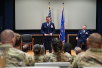 Col. Jeremy Patrick, 433rd Operations Group commander and presiding official, delivers remarks during an assumption of command ceremony for the 433rd Aeromedical Evacuation Squadron at Joint Base San Antonio-Lackland, Texas, July 12, 2025.