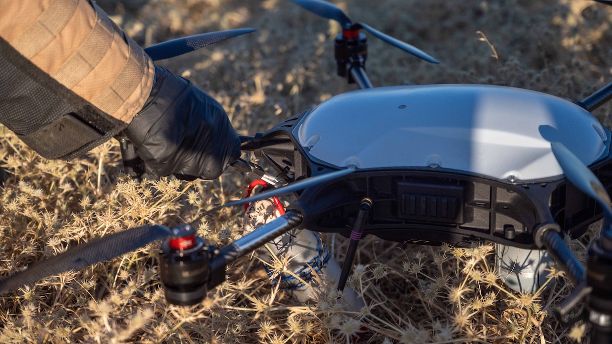 Pliers clip zip tie on drone