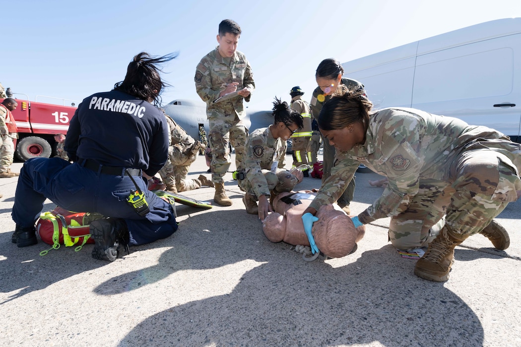 Paramedics treat simulated patients