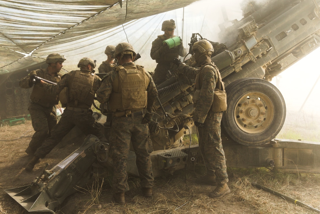 U.S Marines, with Golf Battery, Battalion Landing Team 1st Battalion, 7th Marine Regiment, 31st Marine Expeditionary Unit, work together to quickly reload their M777 towed 155mm howitzer during a 15 round fire mission in Queensland, Australia on July 13, 2025 as part of Talisman Sabre 2025.