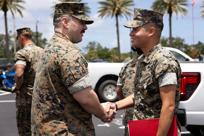 U.S. Marines congratulate Cpl. Nicholas Martinez