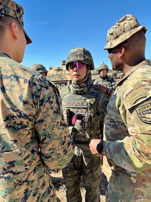 Gen Xavier Brunson, Commander of the United Nations command, Combined Forces Command and U.S Forces Korea talks with a Republic of Korea Marine from the 11th Artillery Battalion, 1st Marine Division during Talisman Sabre at the Shoalwater Bay Training Area in Queensland July 14, 2025.