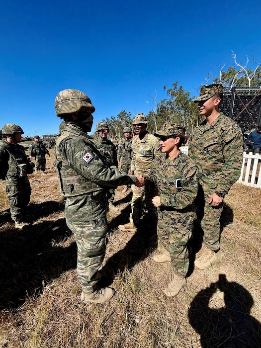 U.S. Marine Corps Maj. Gen. Valerie A. Jackson, commander of U.S. Marine Corps Forces Korea, shakes hands with a Republic of Korea Marine from the 11th Artillery Battalion, 1st Marine Division at the Shoalwater Bay Training Area in Queensland July 14, 2025.