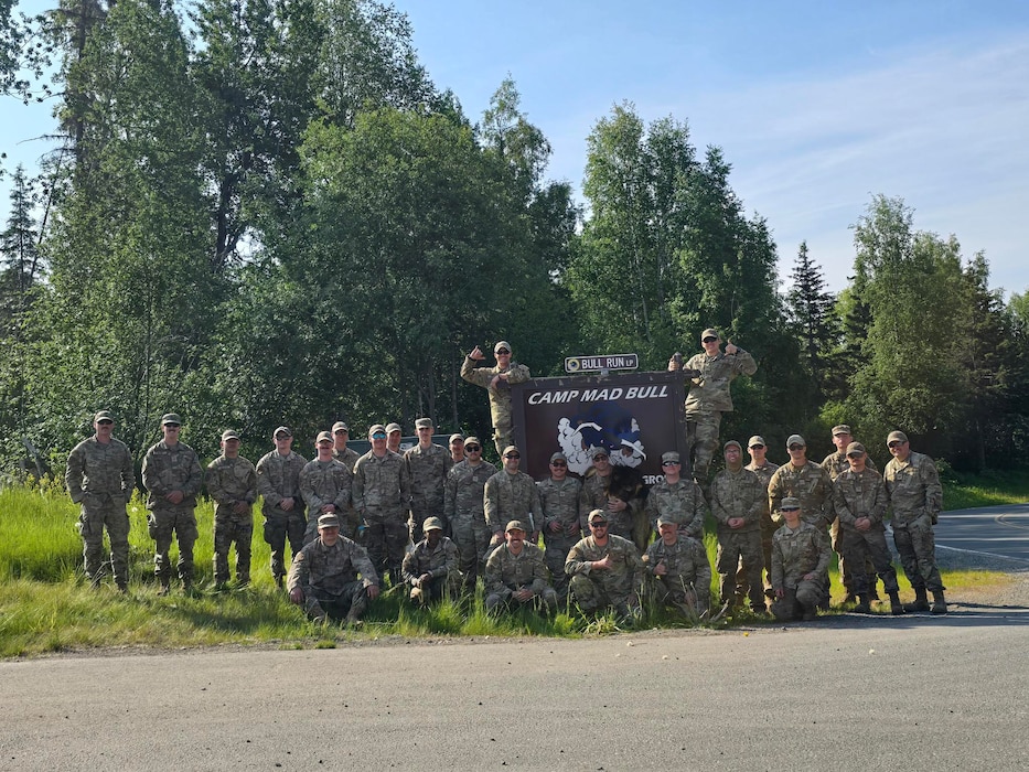 U.S. Air Force 354th Civil Engineering Squadron Airmen pose for a group photo at Joint Base Elmendorf-Richardson, Alaska, June 20, 2025.