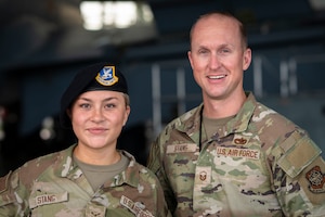 U.S. Air Force Airman 1st Class Isabella Stang, left, 6th Security Forces Squadron administration and reports clerk, and MasterSgt. Joseph Stang, 6th Aircraft Maintenance Squadron production superintendent, pose for a photo at MacDill Air Force Base, Florida, July 2, 2025. This father and daughter duo have had the rare opportunity to be stationed at the same base at the same time, serving in the 6th Air Refueling Wing’s mission to project air-refueling power worldwide. (U.S. Air Force photo by Senior Airman Alicia Campbell)