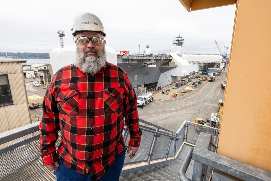 Eric Haslehurst, mechanical engineering technician, Code 260.1, Carrier Rotating Machinery, recently received the Carrier One Team's "Excellence in Carrier Maintenance Award" for his work at at Puget Sound Naval Shipyard & Intermediate Maintenance Facility in Bremerton, Washington. (U.S. Navy photo by Ben Hutto)