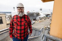 Eric Haslehurst, mechanical engineering technician, Code 260.1, Carrier Rotating Machinery, recently received the Carrier One Team's "Excellence in Carrier Maintenance Award" for his work at at Puget Sound Naval Shipyard & Intermediate Maintenance Facility in Bremerton, Washington. (U.S. Navy photo by Ben Hutto)
