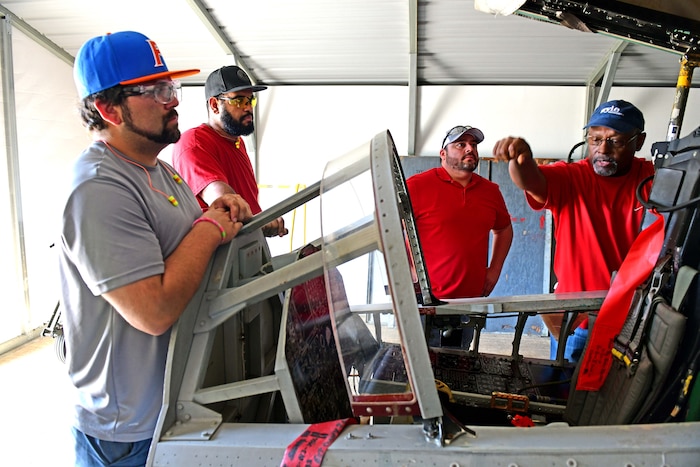 instructor pointing out parts