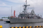The Avenger-class mine countermeasures ship USS Warrior (MCM 10) arrives in Niigata, Japan for a scheduled port visit, July 12, 2025.