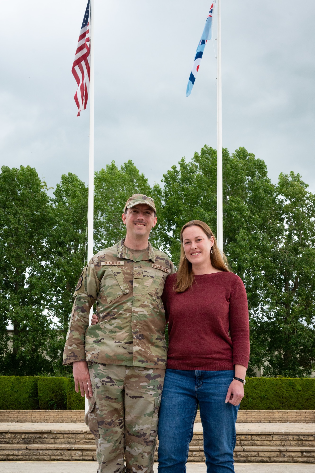 Tech. Sgt. Erik Stauffer, 420th Air Base Squadron noncommissioned officer in charge (NCOIC) of radio frequency transmissions, and his wife, Sophie Stauffer, pose for a photo at RAF Fairford