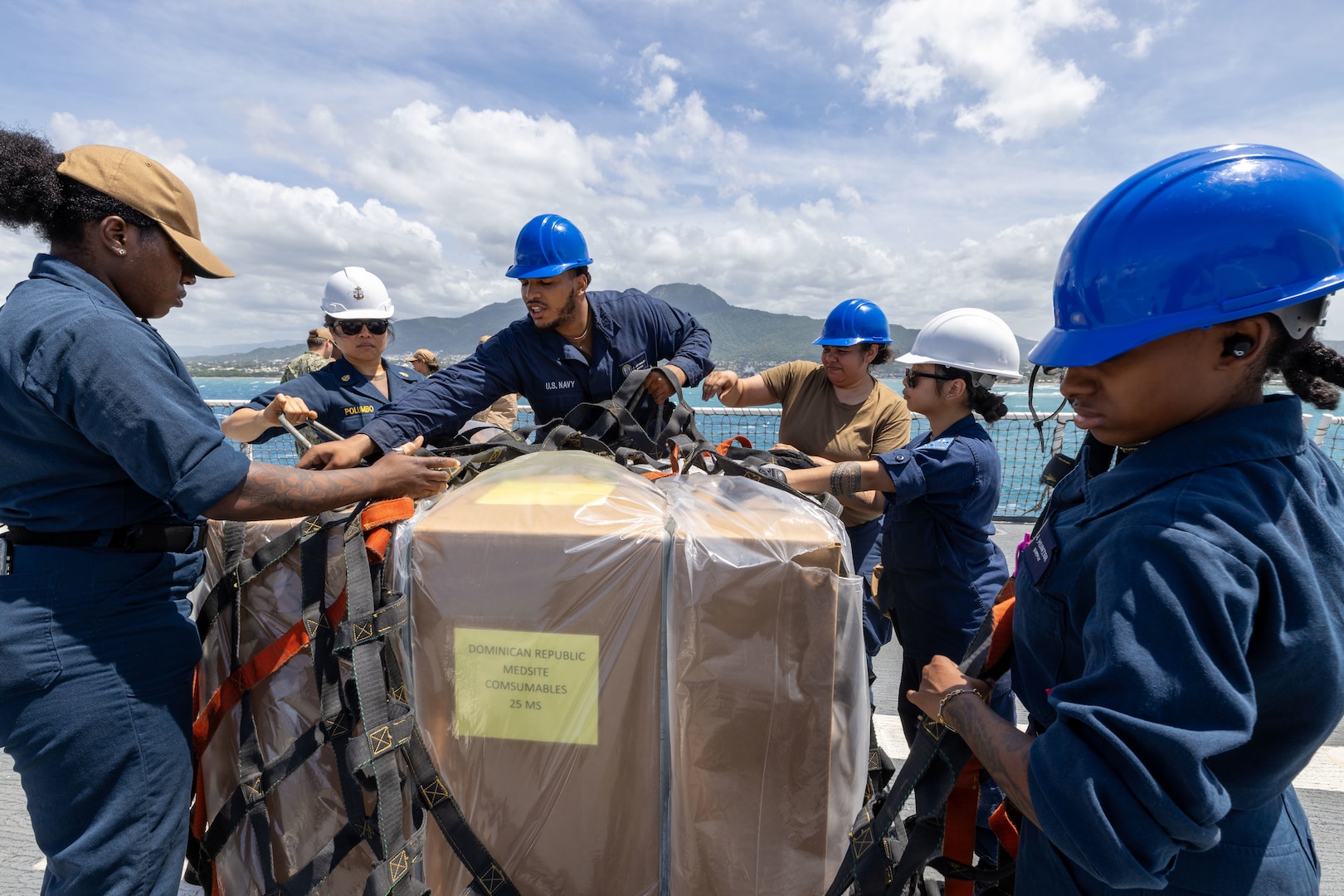 PUERTO PLATA, Dominican Republic (July 15, 2025) Sailors assigned to the Mercy-class hospital ship USNS Comfort (T-AH 20) load medical site cargo aboard Comfort in Puerto Plata, Dominican Republic during Continuing Promise 2025, July 15, 2025. Continuing Promise 2025 is the 16th iteration of the U.S. 4th Fleet/U.S. Naval Forces Southern Command-led Mission since 2007, which aims to foster goodwill, strengthen existing partnerships with partner nations, and form new partnerships between host nations, non-federal entities, and international organizations. (U.S. Navy photo by Mass Communication Specialist 2nd Class Alfredo Marron)
