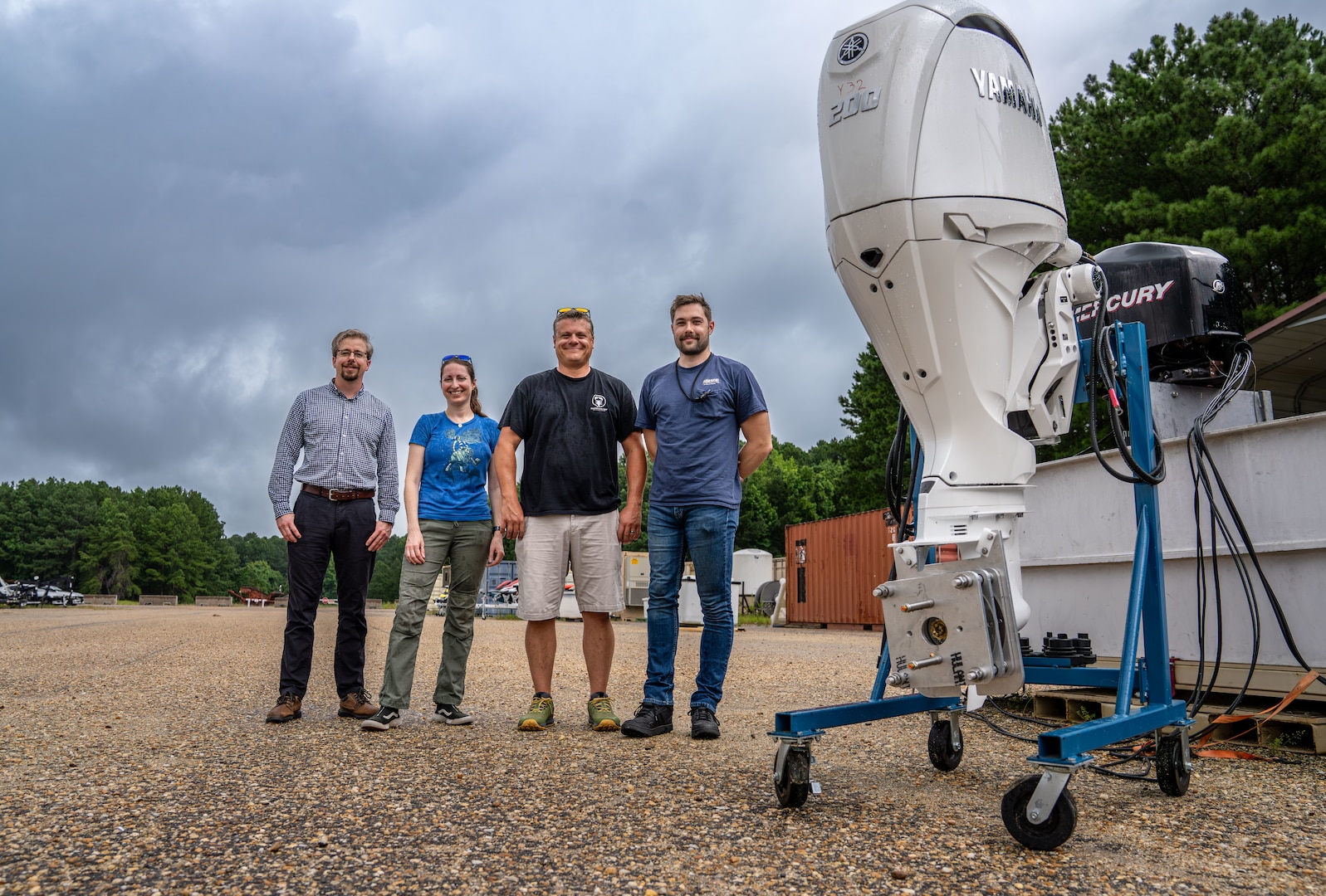 DAHLGREN, Va. – Naval Surface Warfare Center Dahlgren Division’s stakeholders from left, Alan Overby, branch head; Amy Meyer, physicist; Adam Suleske, physicist; August Valentour, mechanical engineer; and Joel Mejeur (not pictured), guided students during the Virginia Tech Interdisciplinary Capstone program. (Dorina Watermolen/NSWCDD Photo)