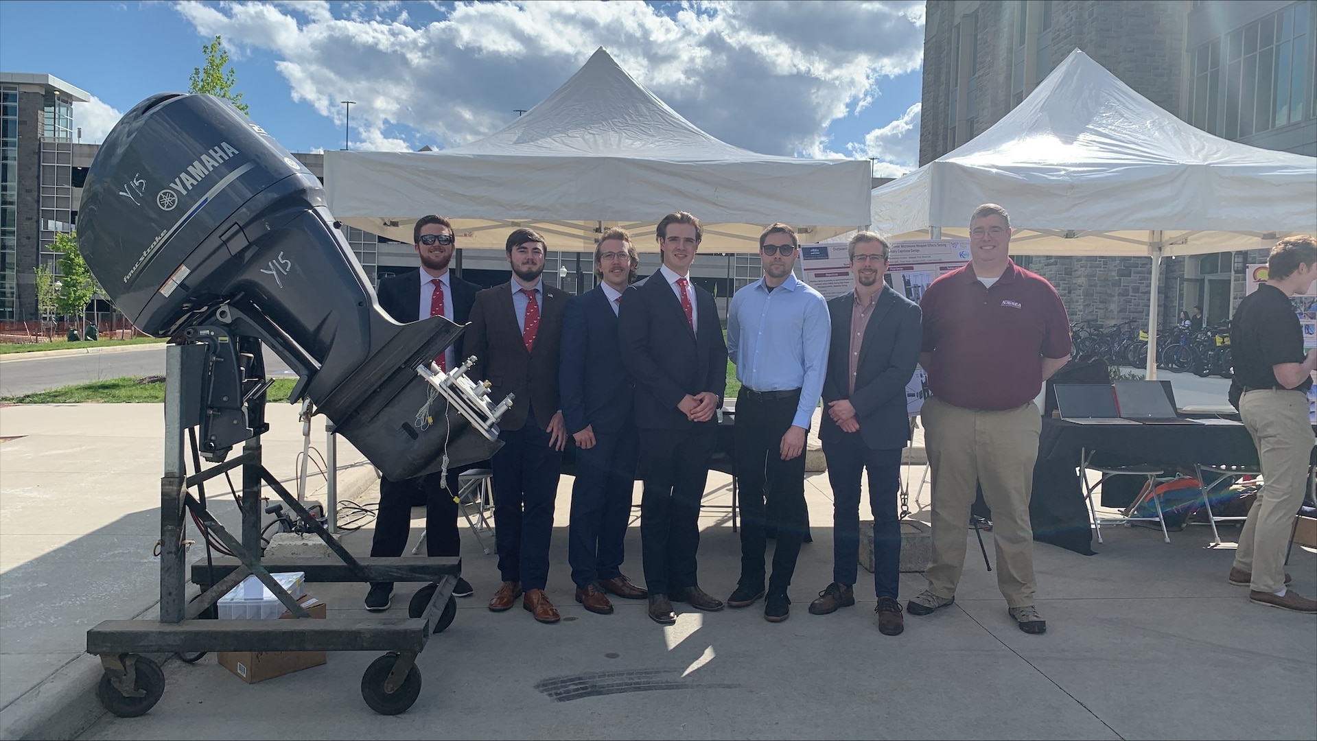 BLACKSBURG, Va. – From left, Hunter Eddings, Dylan Myers-DeMarco, Conor Finch and Leo Miele participated in the Virginia Tech Interdisciplinary Capstone program in 2023-2024 and designed a solution for Naval Surface Warfare Center Dahlgren Division (NSWCDD), conceptualizing an Outboard Motor Dynamometer system that uses eddy current braking for energy dissipation. (NSWCDD Photo)