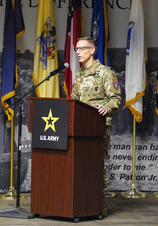 Male Senior leader in duty uniform gives speech at welcoming ceremony