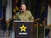 A male Chief Warrant 5 gives a speech at the welcoming ceremony.