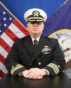 Cmdr. Justin D. Russell