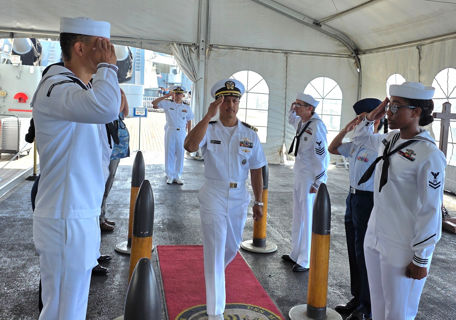 Incoming and outgoing commander walks into ceremony.