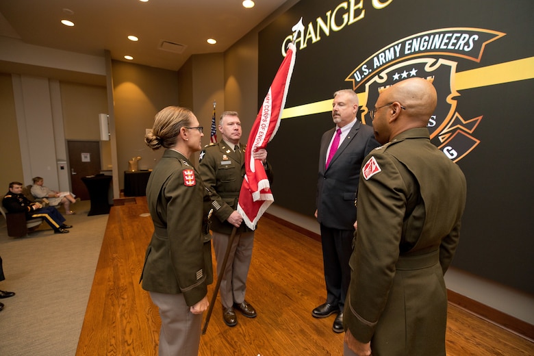 Lt. Col. Joshua Haynes holds the USACE flag during the Change of Command Ceremony, solidifying his role as ERDC's 13th Commander.