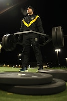 1st Lt. Juan Santiago, financial officer, 1st Theater Sustainment Command, performs a deadlift during the Army Fitness Test, Fort Knox, Kentucky.
