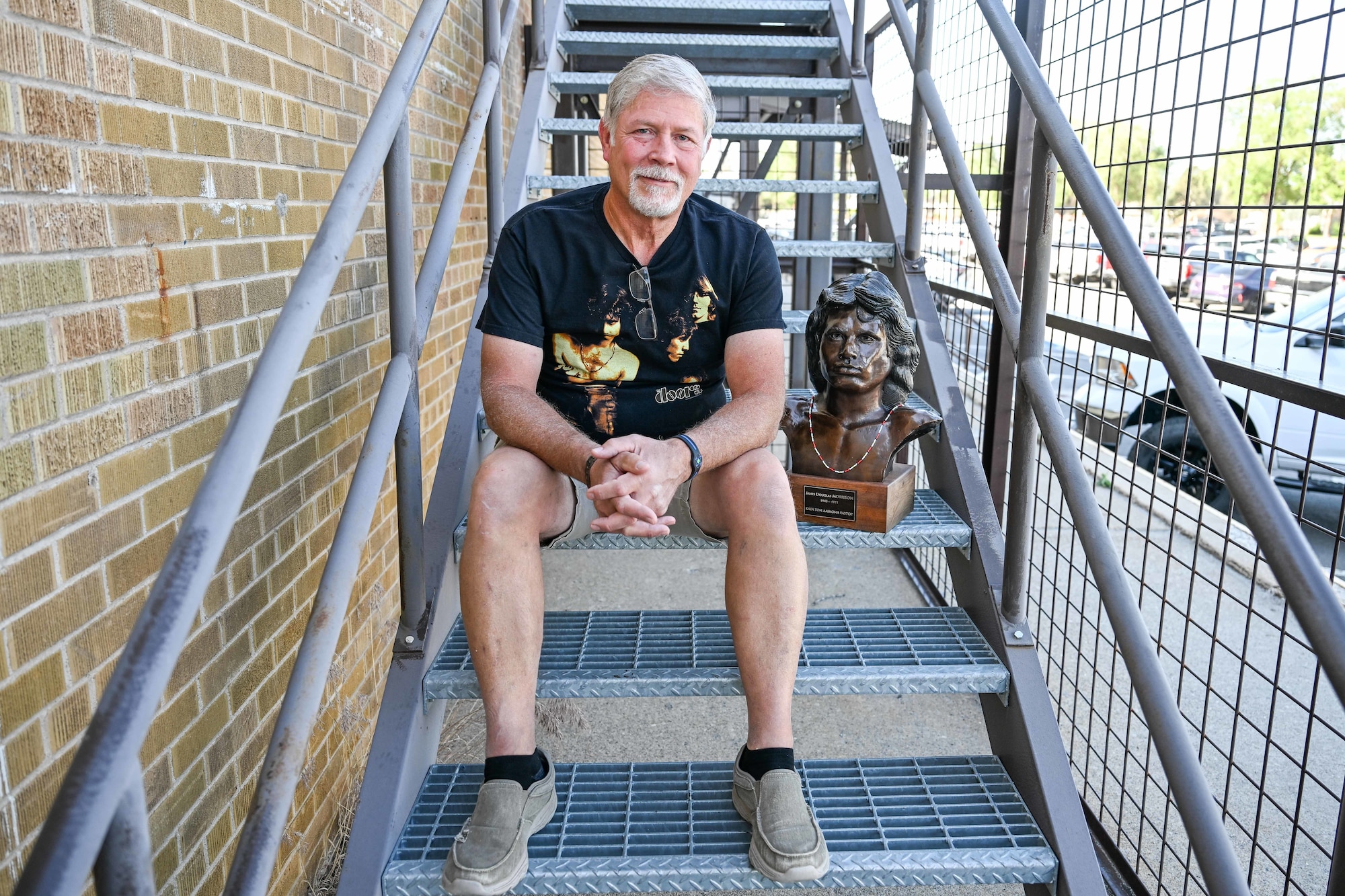 Todd Mitchell, an electronics technician at 582nd Missile Maintenance Squadron, with his Jim Morrison bust June 13, 2025, at Hill Air Force Base, Utah. (U.S. Air Force photo by Cynthia Griggs)