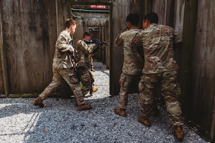 Soldiers with Bravo Company, 1st Battalion, 112th Infantry Regiment, 56th Stryker Brigade Combat Team practice various close quarter battle techniques at the live fire shoot house complex at Fort Indiantown Gap, Pennsylvania, June 10, 2025. The Soldiers conducted several iterations to practice movement while firing live rounds. (U.S. Army National Guard photo by Staff Sgt. Jonathan Campbell)