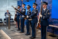 Members of the U.S. Air Force Honor Guard present the colors during the singing of “The Star-Spangled Banner” during an enlistment ceremony at the Air & Space Forces Association headquarters in Arlington, Va., July 11, 2025. The Honor Guard presented the colors to support their mission of delivering premier ceremonial honors, inspiring the nation and representing all Airmen and Guardians to the world. (U.S. Air Force photo by Hayden Hallman)