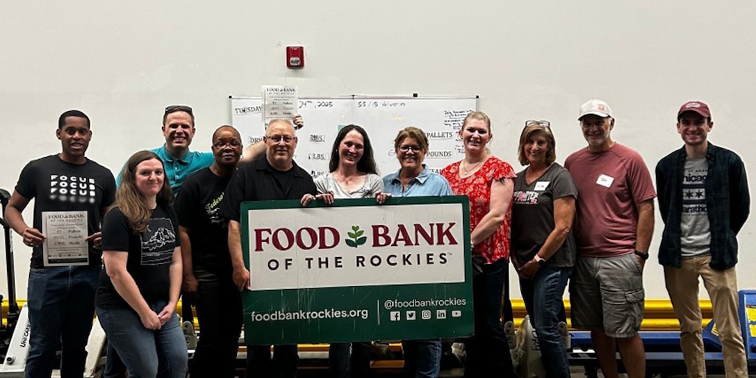 A contracts team within Defense Contract Management Agency’s Mountain Pacific region pose for a group photo after using their personal time to volunteer at the Food Bank of the Rockies Jun. 24, 2025.