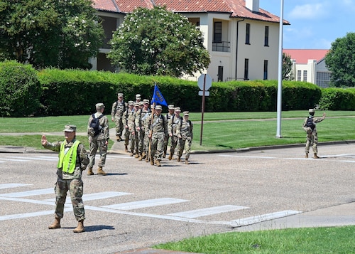 Air Force Reserve Officer Training Corps cadets march back to their squadron after chow at Maxwell Air Force Base, June 23, 2025.
