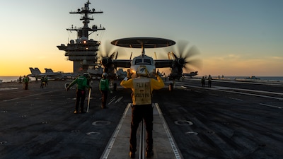 TIMOR SEA (July 14, 2025) — An E-2D Hawkeye, attached to Carrier Airborne Early Warning Squadron (VAW) 125, prepares to take off from the flight deck of Nimitz-class aircraft carrier USS George Washington (CVN 73) while underway in the Timor Sea in...