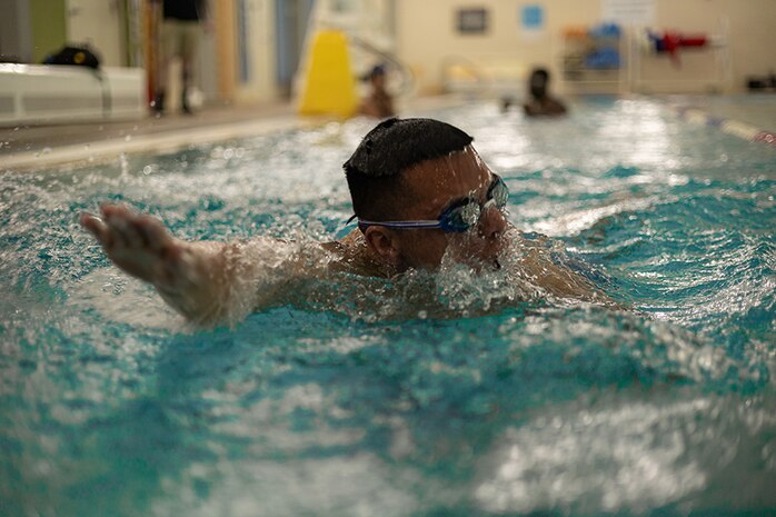 U.S. Army Spc. Alexis Pantoja swims towards the end of the lane to practice his turn around at swimming practice during the 2025 Department of Defense Warrior Games  at Fort Carson, Colorado, July 14, 2025.