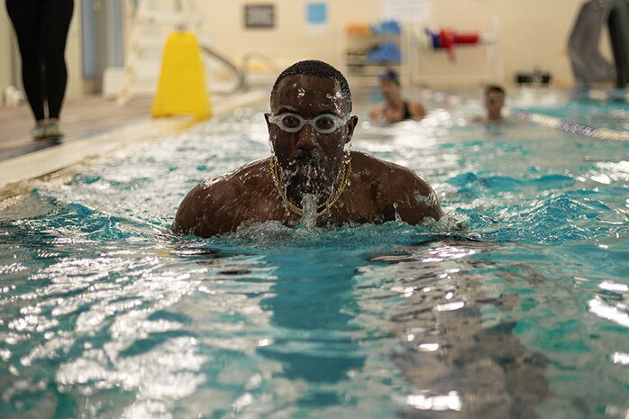 U.S. Army Master Sgt. Earlie Brown swims towards the end of the lane to practice his turn around at swimming practice during the 2025 Department of Defense Warrior Games  at Fort Carson, Colorado, July 14, 2025.