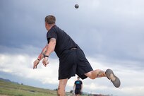 U.S. Army Staff Sgt. Tyler Pollard puts a shot at field practice during the 2025 Department of Defense Warrior Games  at Fort Carson, Colorado, July 14, 2025.