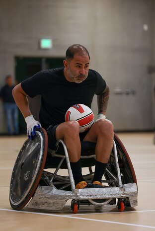U.S. Army Capt. Carlos Rivera conducts drills at wheelchair rugby practice during the 2025 Department of Defense Warrior Games practice sessions at Fort Carson, Colorado, July 14, 2025.