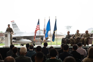 Lt. Gen. David Iverson, Seventh Air Force commander, passes the guidon to Chief Master Sgt. Thomas Schaefer, signifying his assumption of responsibility as the command chief master sergeant for Seventh Air Force during a Change of Responsibility ceremony at Osan Air Base, Republic of Korea, July 17, 2025. Schaefer brings extensive experience from various leadership roles, including a previous assignment as the command chief master sergeant of the 8th Fighter Wing at Kunsan Air Base, Republic of Korea. (U.S. Air Force photo by Staff Sgt. Dustin Braaten)