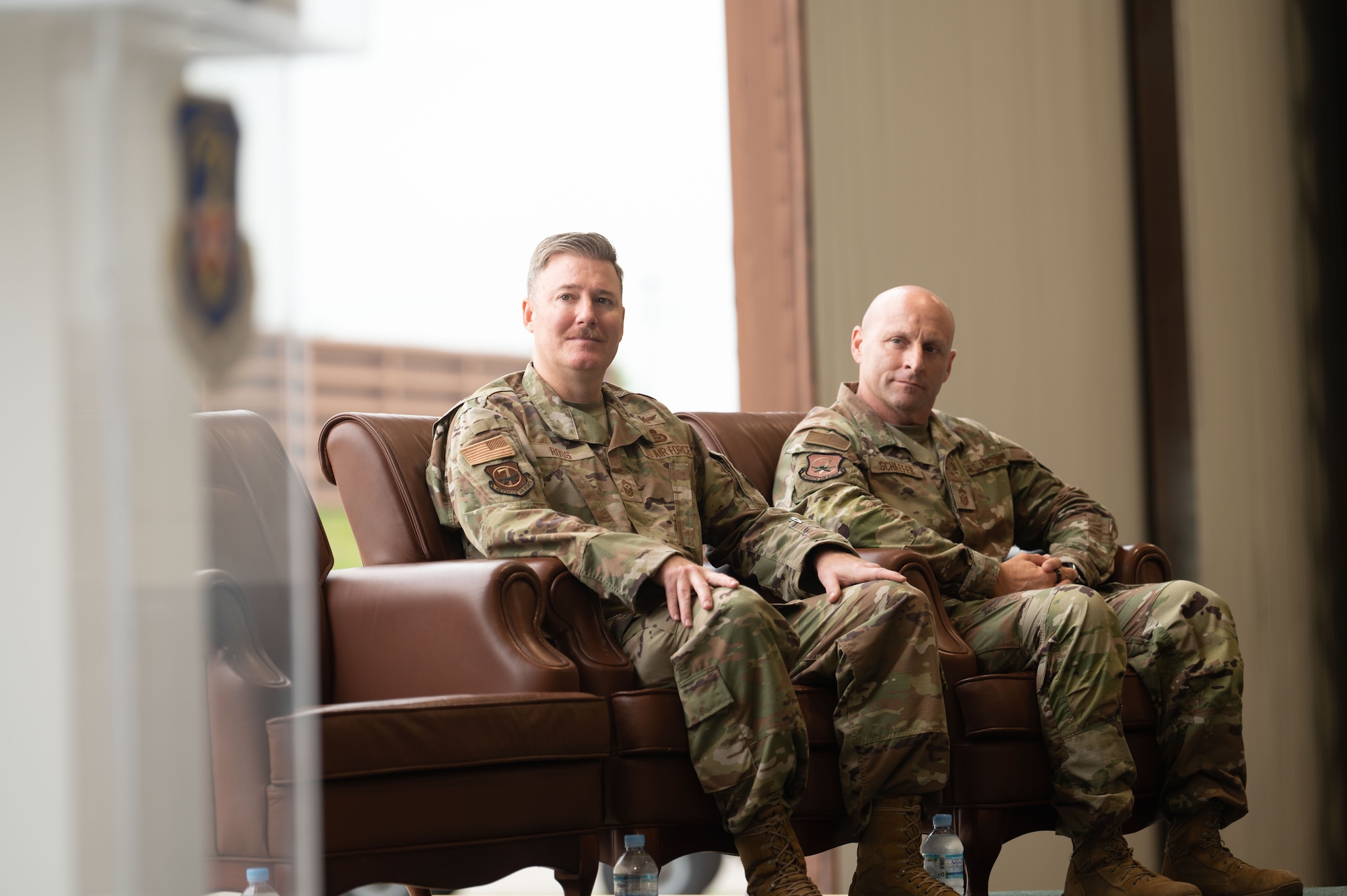 Chief Master Sgt. Jeremiah Ross (left), outgoing Seventh Air Force command chief, and Chief Master Sgt. Thomas Schaefer (right), incoming command chief, attend a Change of Responsibility ceremony at Osan Air Base, Republic of Korea, July 17, 2025. Schaefer previously served as the Command Chief Master Sergeant of the 57th Wing, Nellis Air Force Base, Nevada, and prior to that, as the Command Chief of the 8th Fighter Wing at Kunsan Air Base, Republic of Korea. (U.S. Air Force photo by Staff Sgt. Dustin Braaten)
